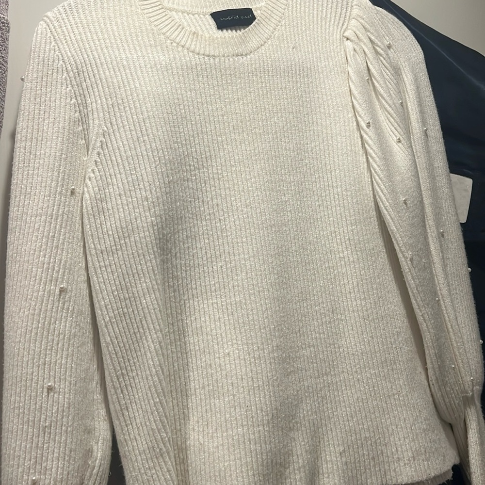 Beautiful sweater with pearl embellishments on the sleeve
